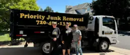 Junk removal team clearing items from a Lakewood property