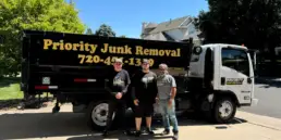 Junk removal team clearing items from a Lakewood property