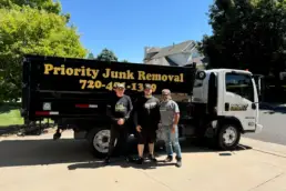 Junk removal team clearing items from a Lakewood property