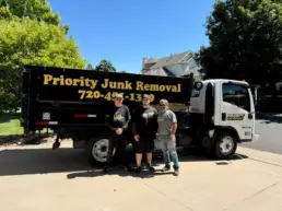 Junk removal team clearing items from a Lakewood property